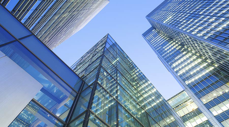 Photo of city skyscrapers looking up from the ground